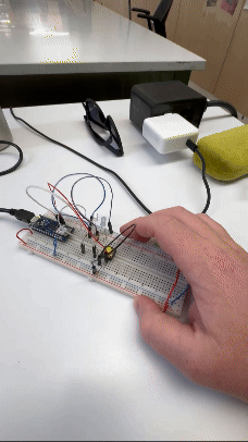 GIF of switch turning on alternating LEDs on Breadboard with Arduino